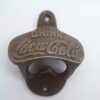 Old vintage antique cast iron style coca cola bottle opener wall mounted