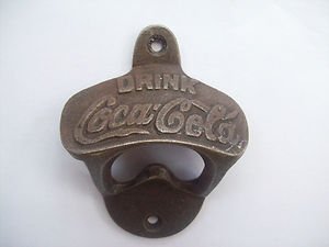 Old vintage antique cast iron style coca cola bottle opener wall mounted