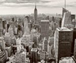 Black and white aerial view of Manhattan skyline with iconic skyscrapers captured in an LED Box Frame, perfect for urban and modern decor.