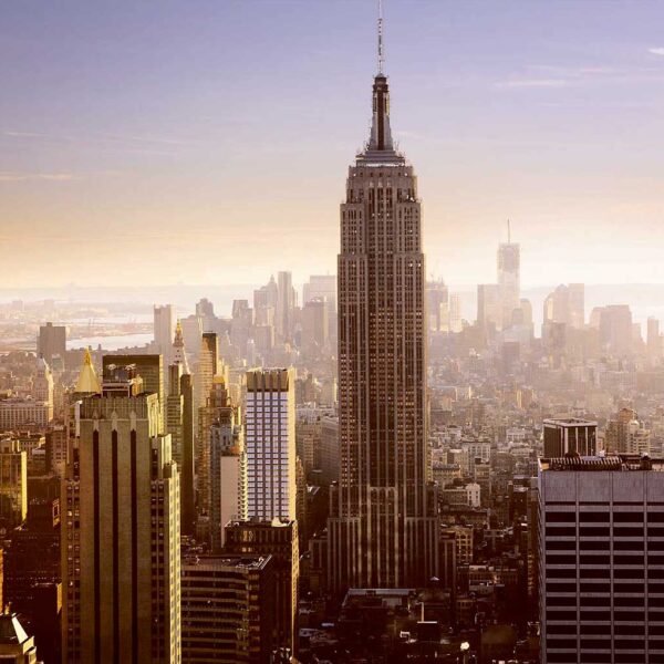 View of the Empire State Building towering over New York City at sunset, captured beautifully in an LED Box Frame for a timeless cityscape.