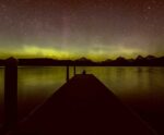 Stunning Northern Lights over a dock at night, perfect for LED Box Frame displays and nature-themed home decor.