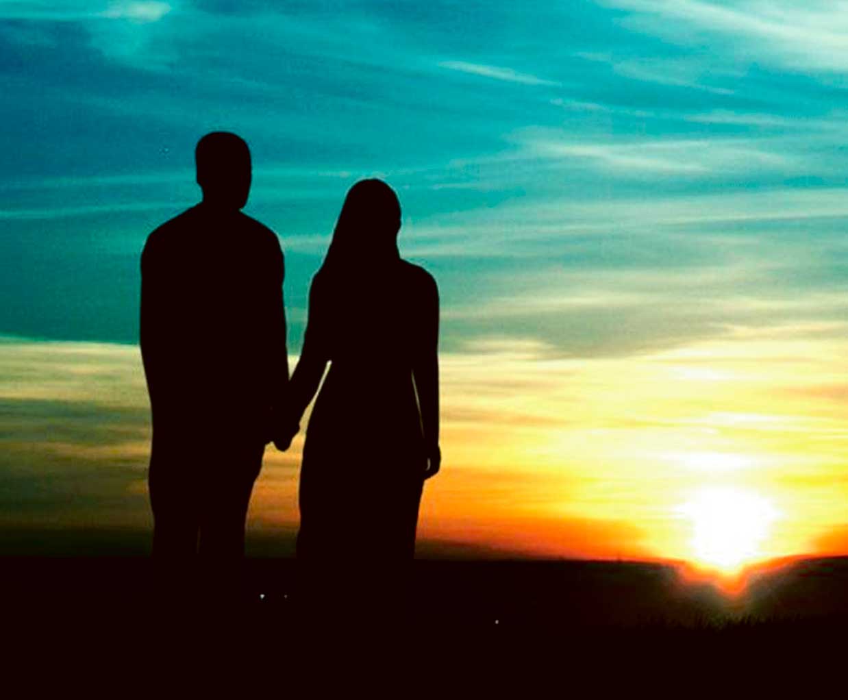 Silhouette of a couple holding hands as the sun sets, captured beautifully in an LED Box Frame, perfect for creating a romantic and serene atmosphere in your home.