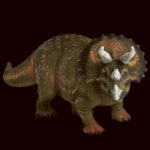 A highly detailed 3D model of a Triceratops dinosaur with distinct horns and frill, captured in a realistic pose.