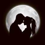 A romantic silhouette of a couple sharing a kiss in front of a glowing full moon, captured beautifully in this LED Box Frame, perfect for adding a touch of romance to any room.
