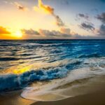 Beautiful sunset over the ocean captured in an LED Box Frame, enhancing your home decor with energy-efficient lighting.