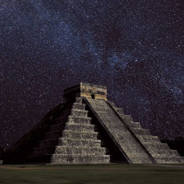 A Mayan pyramid under a breathtaking starry night sky, filled with shimmering constellations